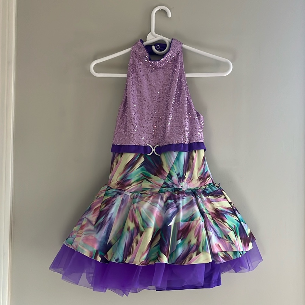 Revolution Dance Wear purple dance costume.